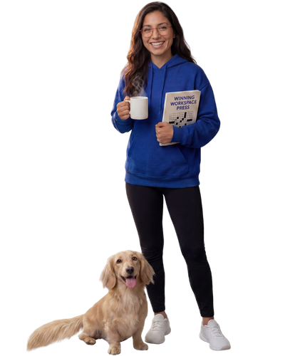 Woman in a blue hoodie holding a mug and a book stands next to a happy golden dog sitting on the floor.